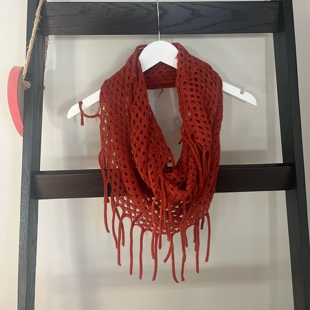 Burnt orange infinity scarf with tassel detail